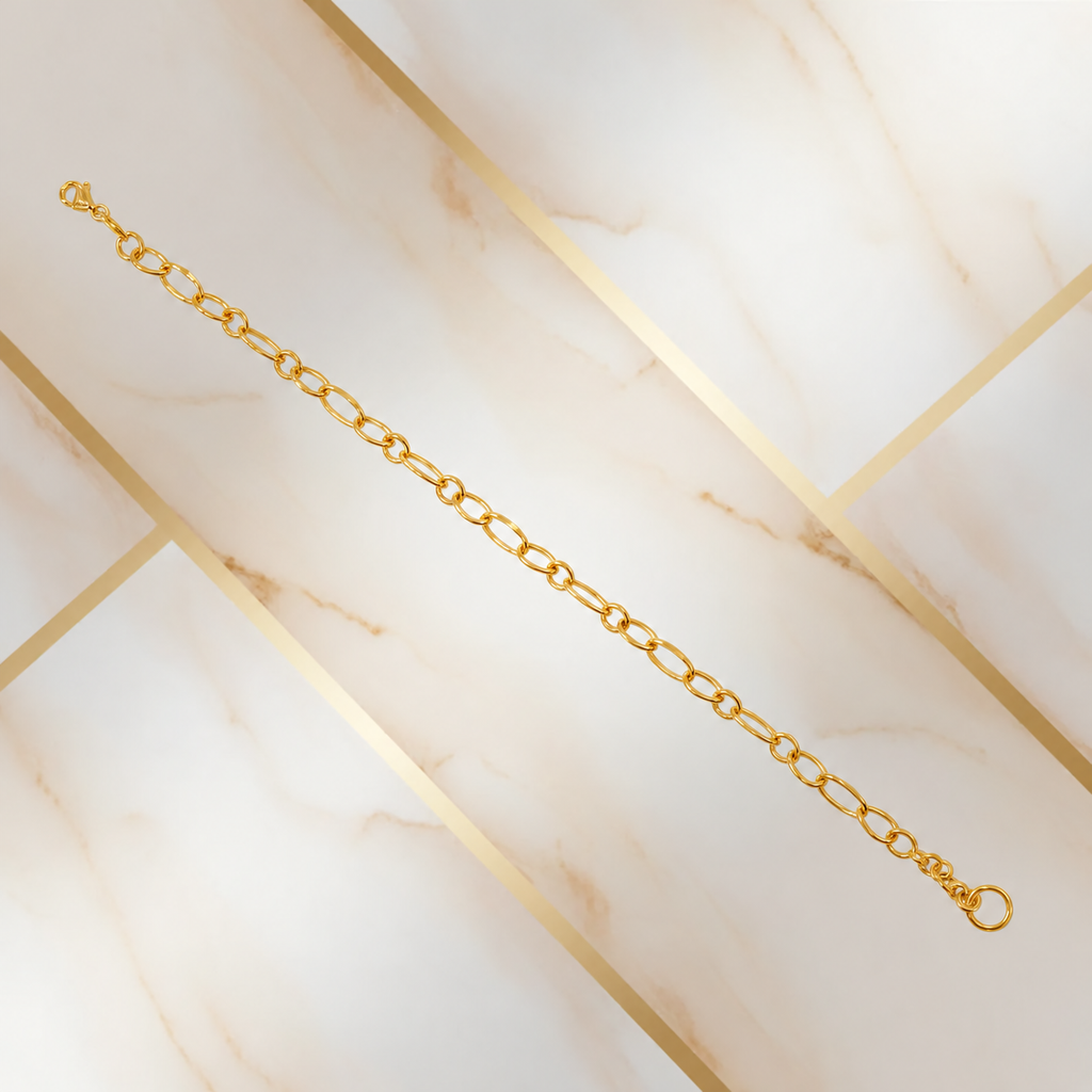 Guild Bullion 916 gold lightweight link bracelet extended diagonally on pale marble