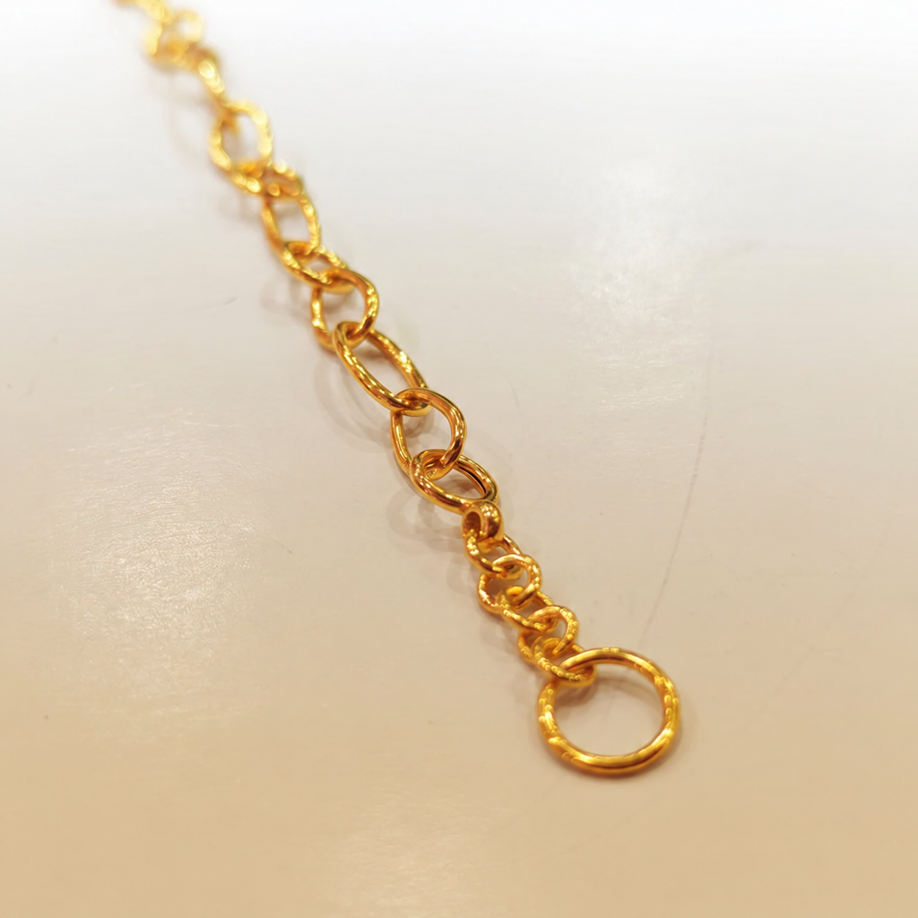 Guild Bullion 916 gold lightweight link bracelet close-up showing textured links and extension rings
