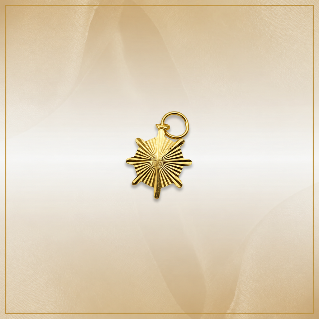 Reverse of the gold anchor medallion pendant showing radiating grooves