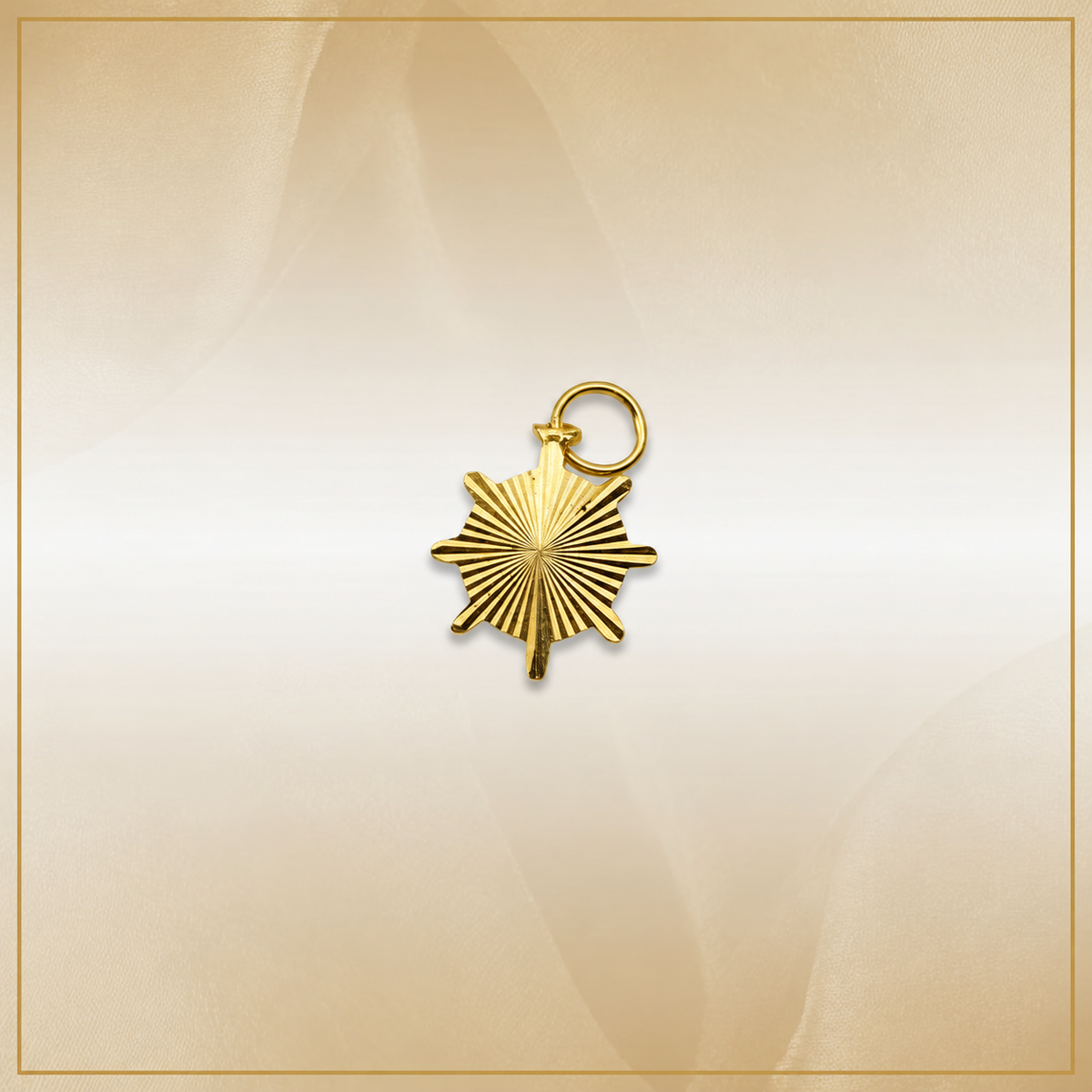 Reverse of the gold anchor medallion pendant showing radiating grooves