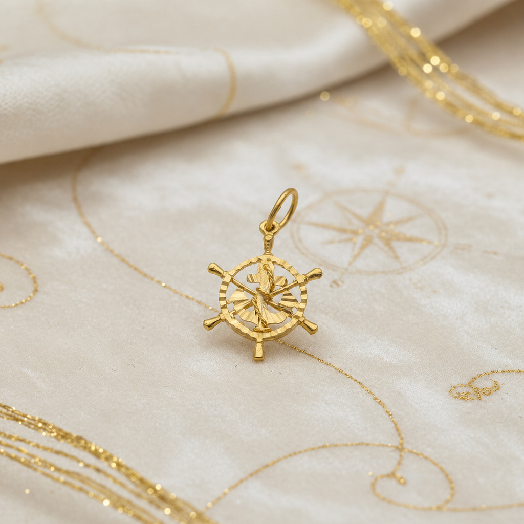Front view of the 916 gold anchor within an openwork ship’s wheel
