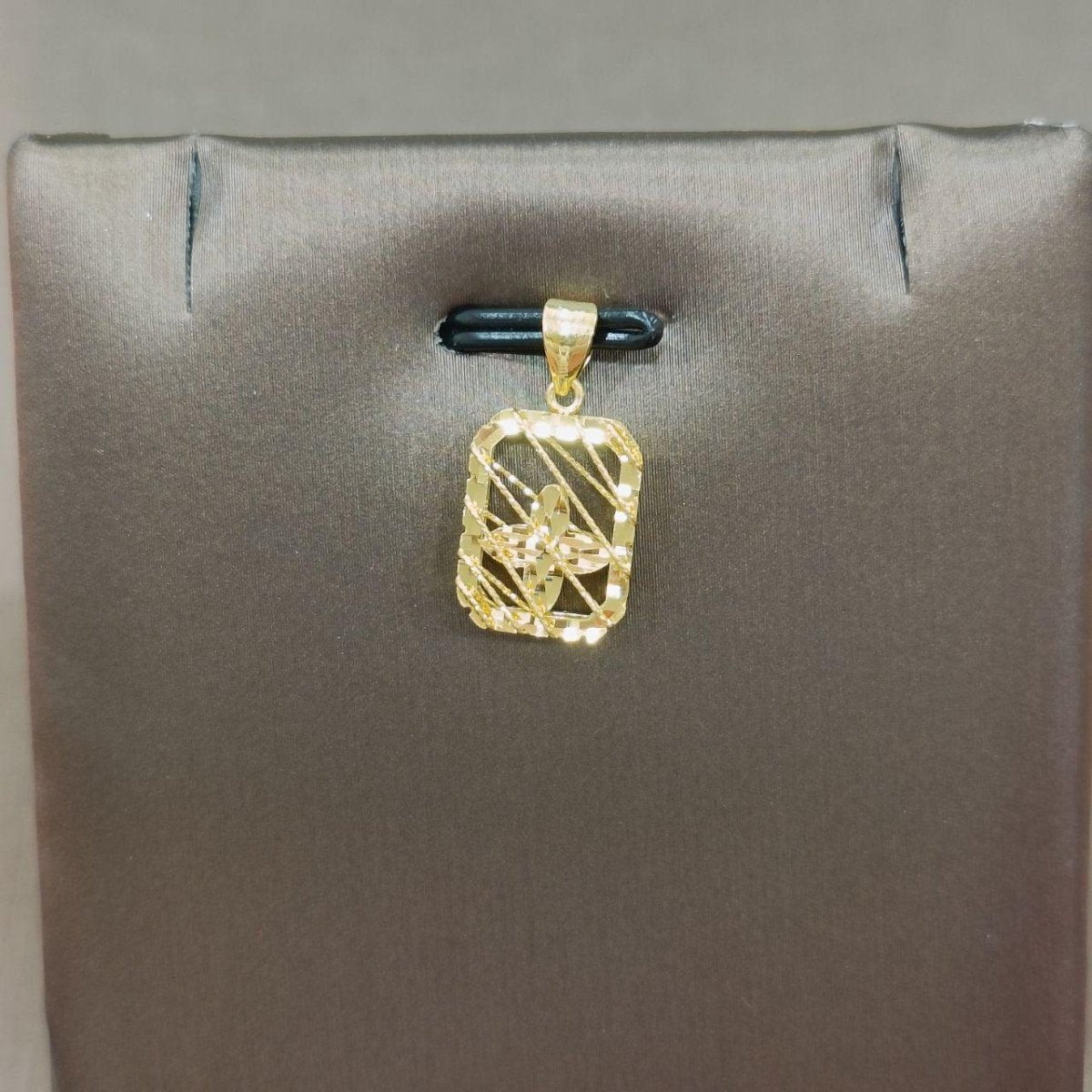 Reverse of the reference rectangular openwork gold pendant