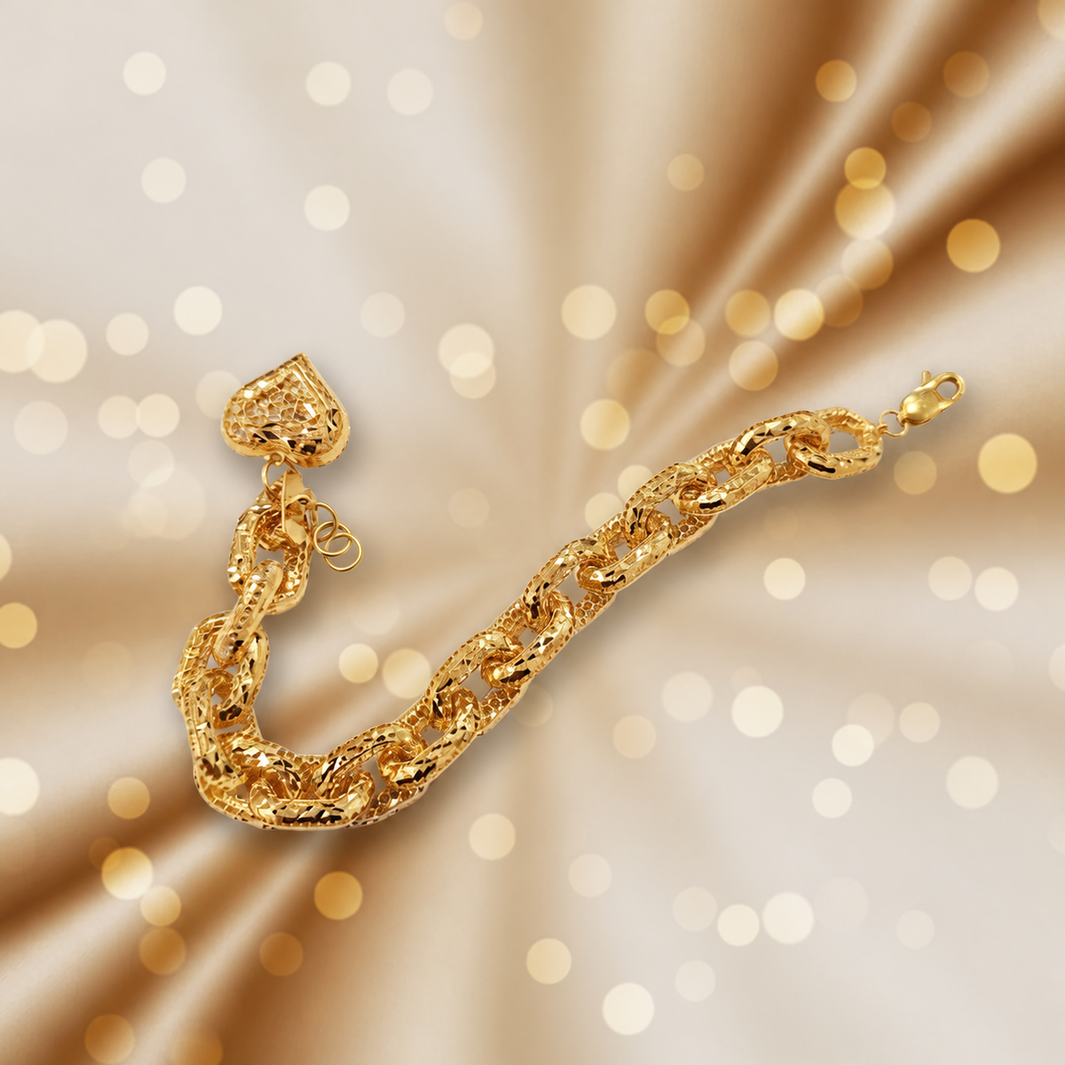 Reverse view of the 22K gold Regal Link Heart Charm Bracelet against a warm gold background