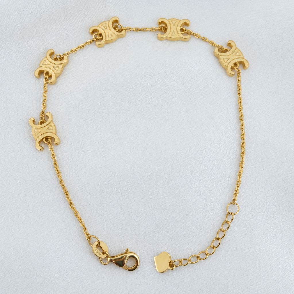 916 gold Scroll Link Bracelet showing engraved motifs, lobster clasp, extension links and end tag