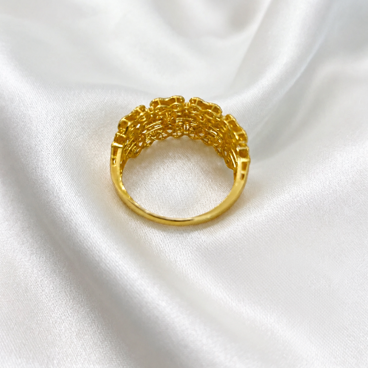 Back view of the 916 gold Serenity Petal ring showing the openwork setting and polished yellow-gold band