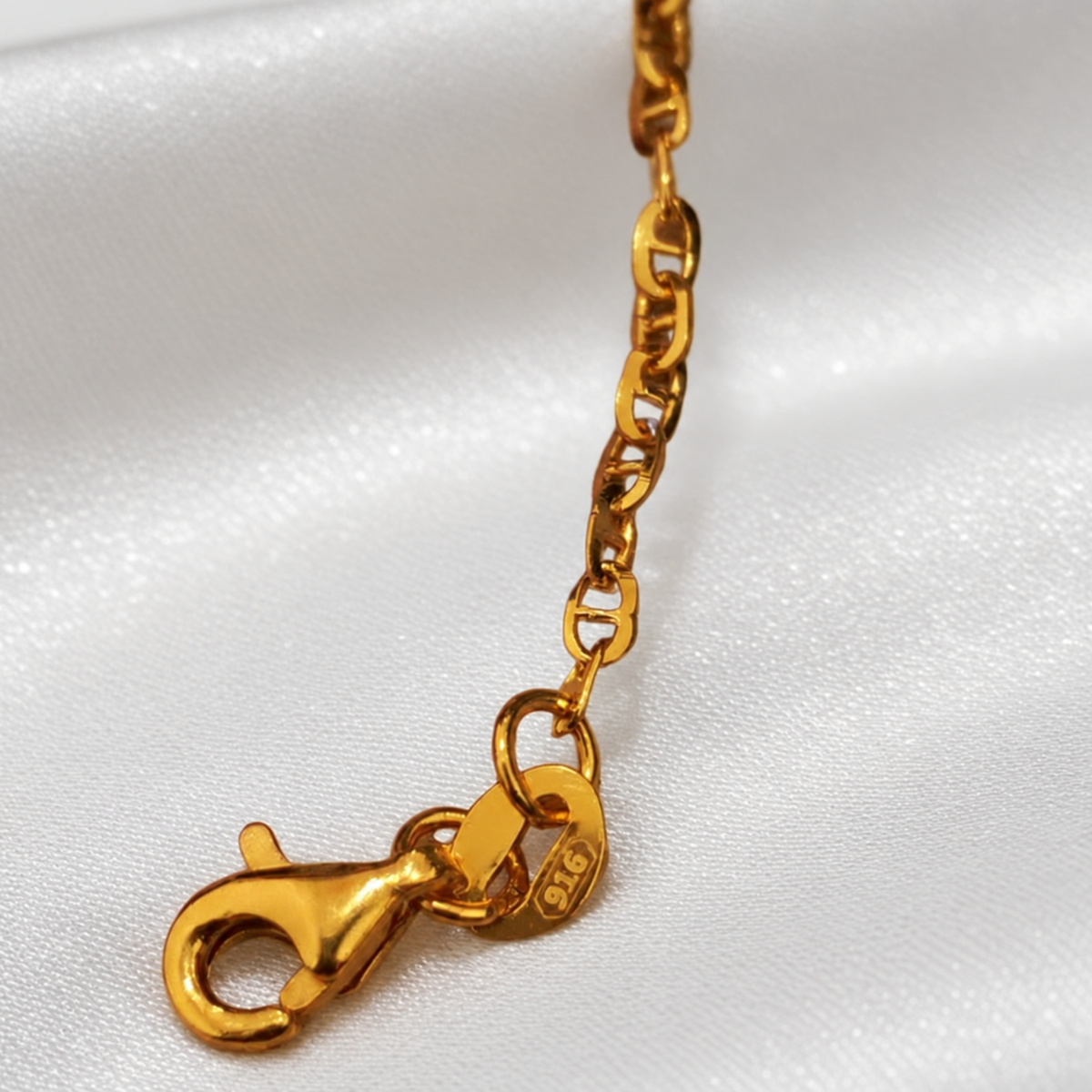 Guild Bullion 916 gold twisted link necklace close-up showing hook clasp and physical 916 hallmark