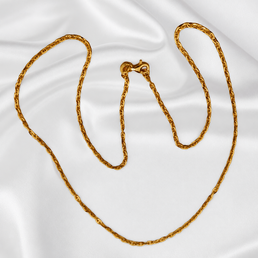 Guild Bullion 916 gold twisted link necklace overview showing polished links and hook clasp on white satin