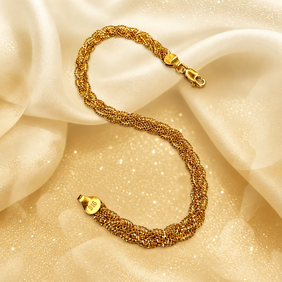 BR22588 916 gold Wave Braided Bracelet in an S shape on cream satin with clasp visible