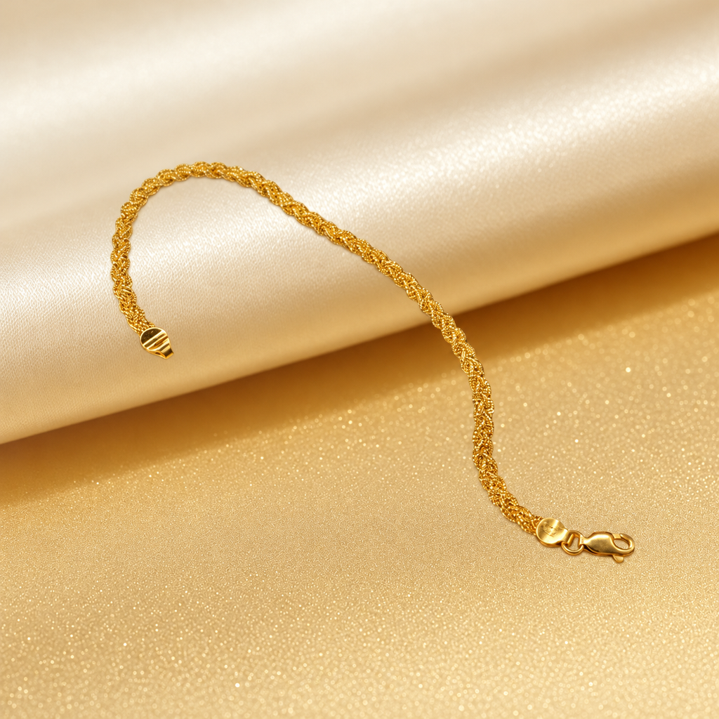 916 gold Wave Braided Bracelet slender braided profile draped over cream satin