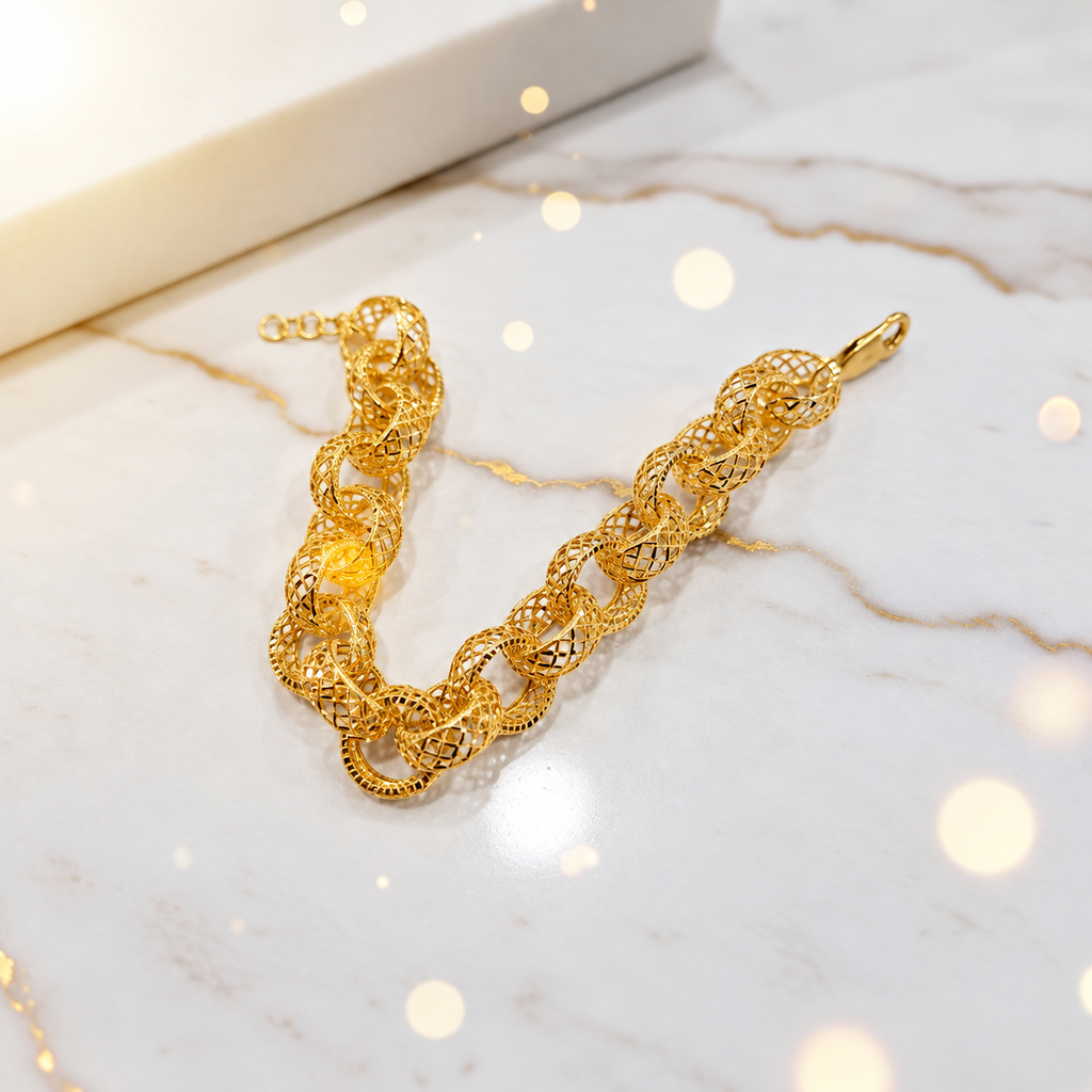 916 gold Wave Ring Bracelet in a U shape on marble with clasp and adjustment rings visible
