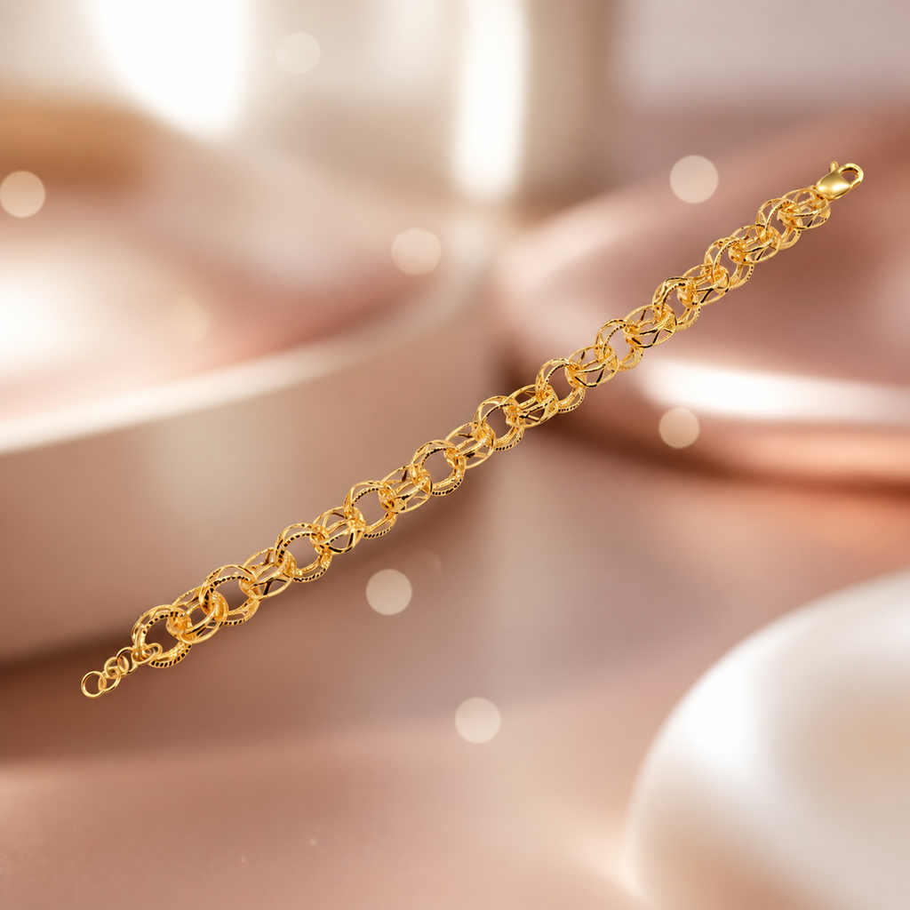 916 gold Wave WW Design Bracelet extended across a soft gold bokeh background with clasp and adjustment rings