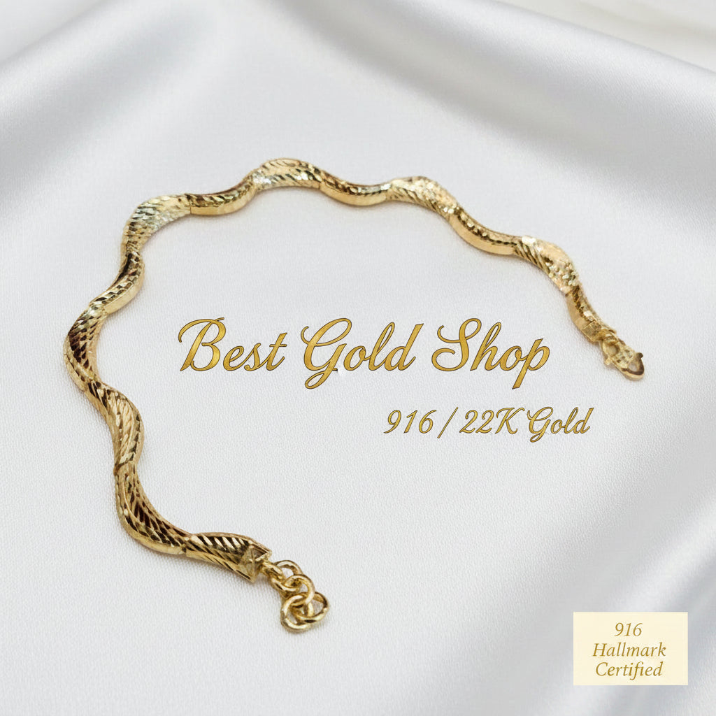 916 gold cut-finish Wavy Bracelet arranged in a C curve on white satin