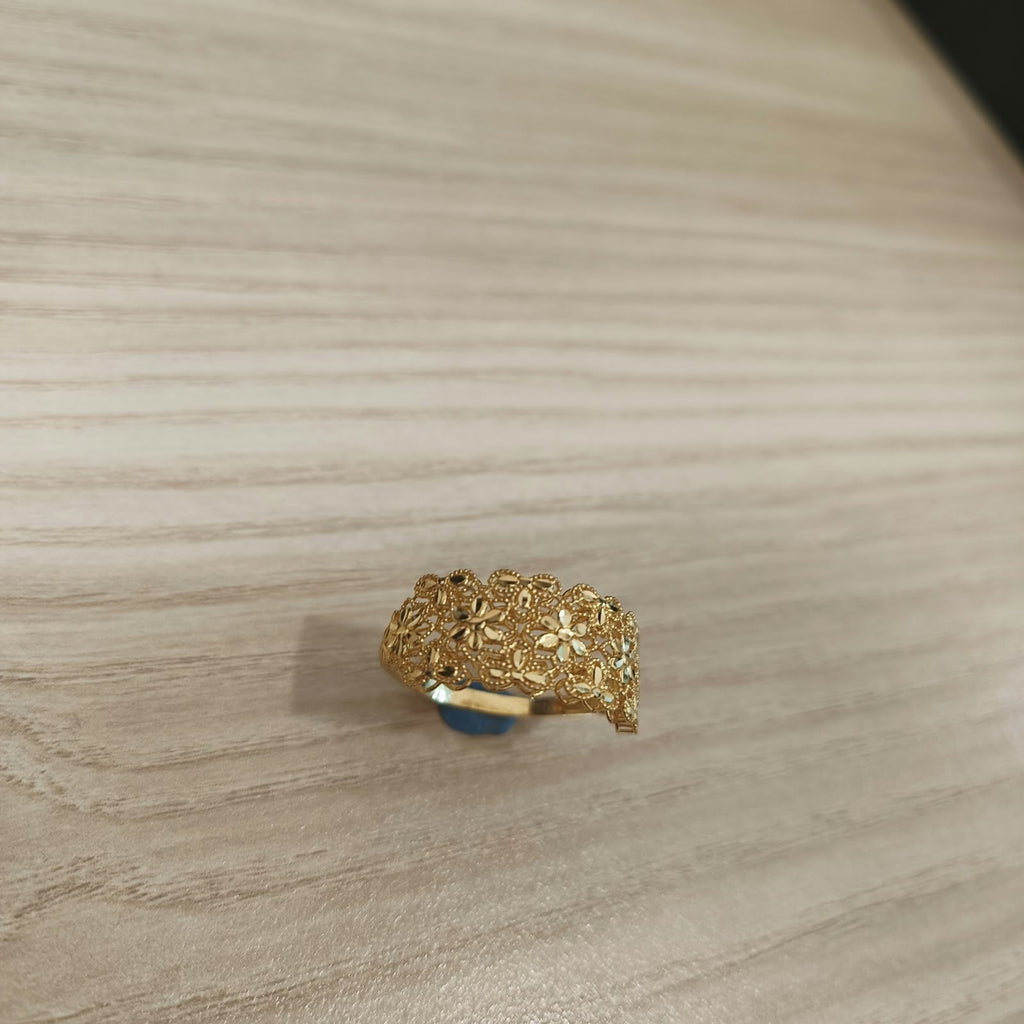 Guild Bullion 916 yellow gold Serenity Petal ring angled close-up showing openwork flowers and beaded edges